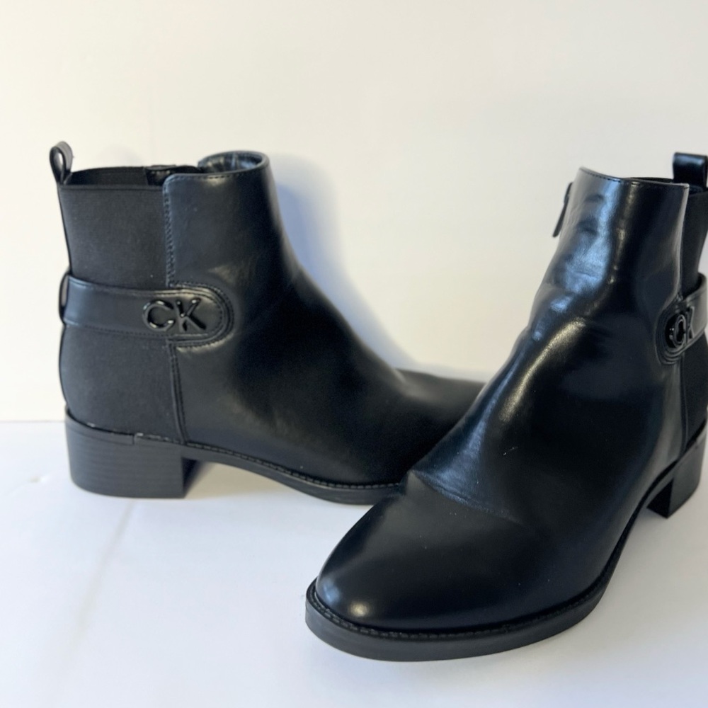 (Final price buy as is) 

Calvin Klein Black Leather Chelsea Ankle Boots